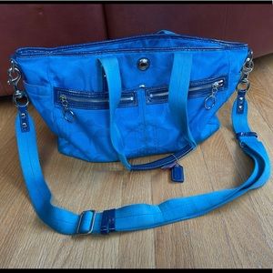 Coach diaper bag bright blue with pink interior used